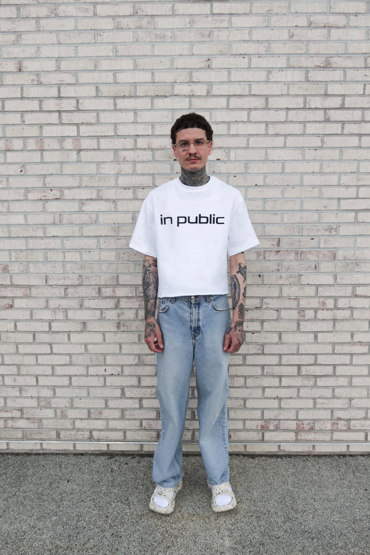 ‘IN PUBLIC’ tee